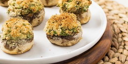 Грибы, фаршированные сыром, в духовке