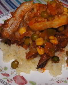 Бараньи ребрышки, тушеные с овощами