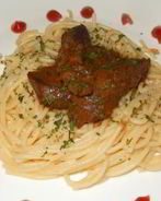 Говяжья печень, тушенная с луком