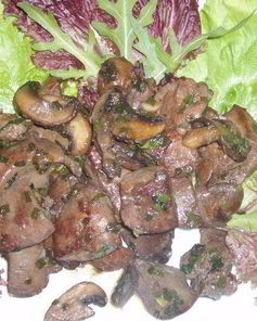 Печень кролика под грибным соусом