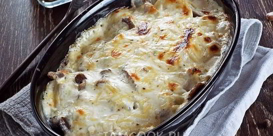 Пельмени с опятами и сыром в духовке