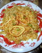 Паэлья с кальмарами в пиве