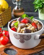 Пилав из перловки с куриными сердечками