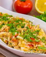 Кальмары с рисом и помидорами