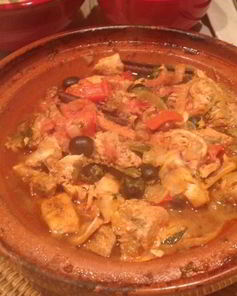 Тушеная рыба с овощами