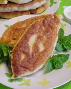 Пирожки с капустой и грибами жареные