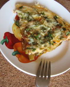 Фриттата с кабачками, помидорами, зеленью и пармезаном